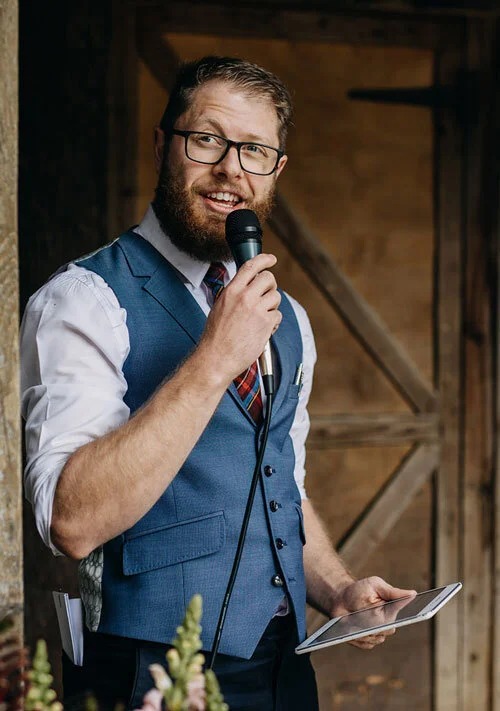 The celebrant hosting a wedding ceremony